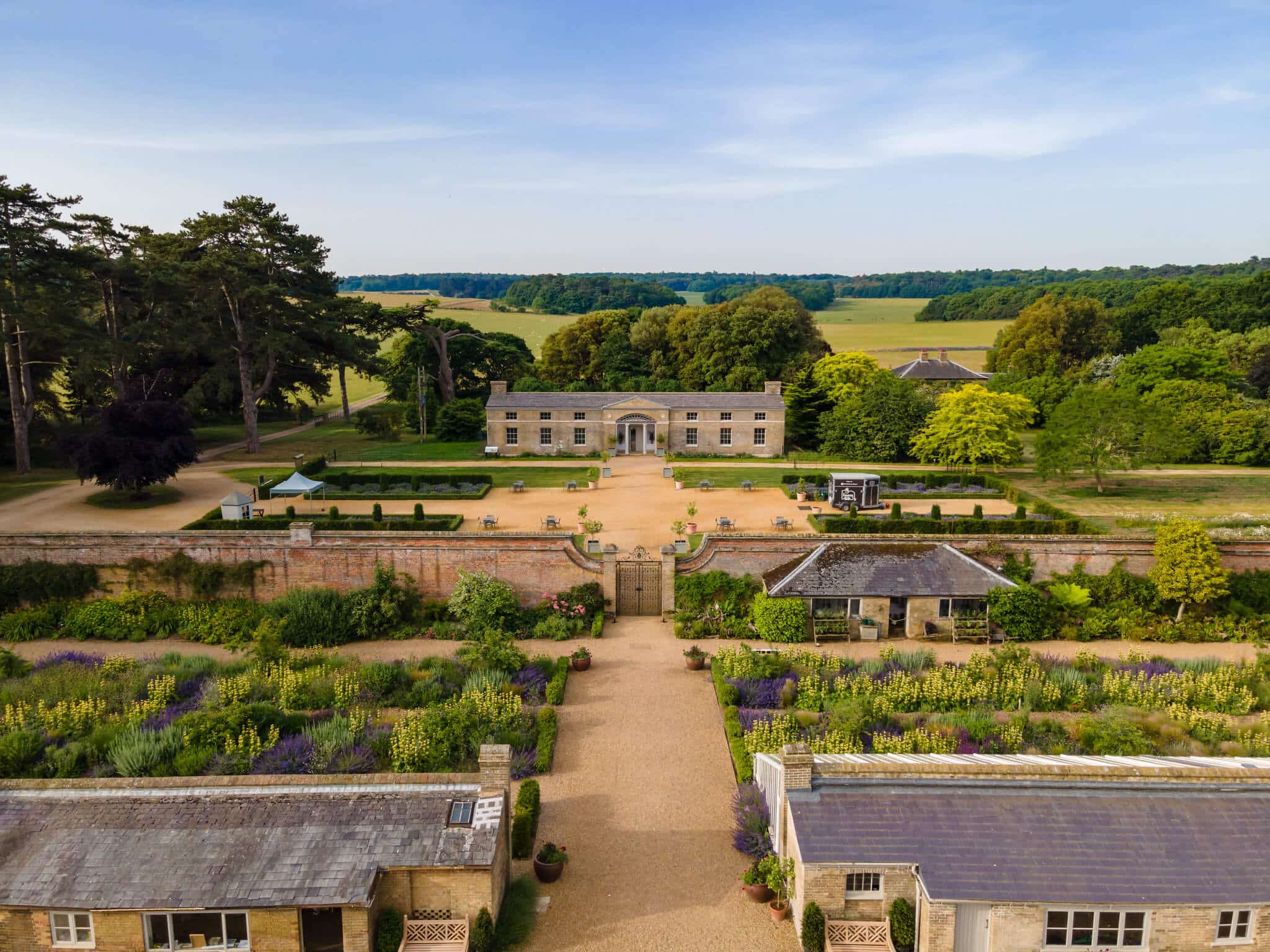 An aerial shot of Holkham's Walled Garden, looking out of the walls towards the Samuel Wyatt Vinery. 