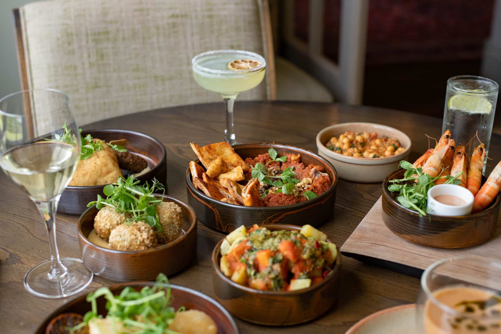 A selection of small plates and cocktails at The Victoria's restaurant