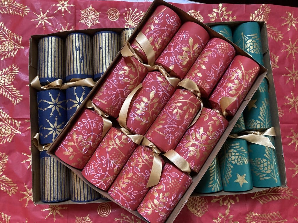 Red, green and blue handmade Christmas Crackers