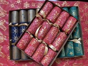 Red, green and blue handmade Christmas Crackers